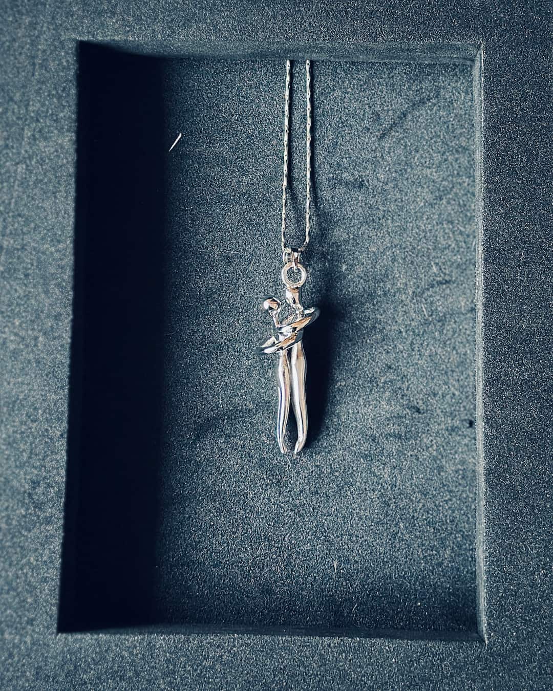 Embrace Knot Silver Pendant