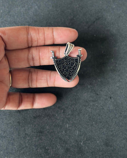 Black-Enamel Shield Silver Charm